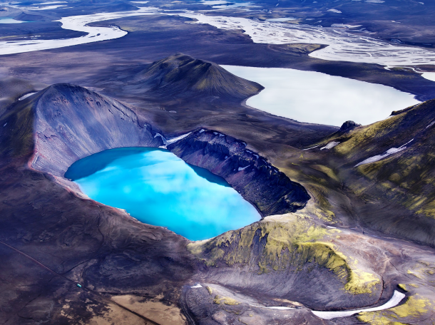 What may be even more beautiful than a volcanic river? A volcanic lake. In many of Icelands volcanoes, especially in the western volcanic zone, crystal clear lakes have formed in the craters.