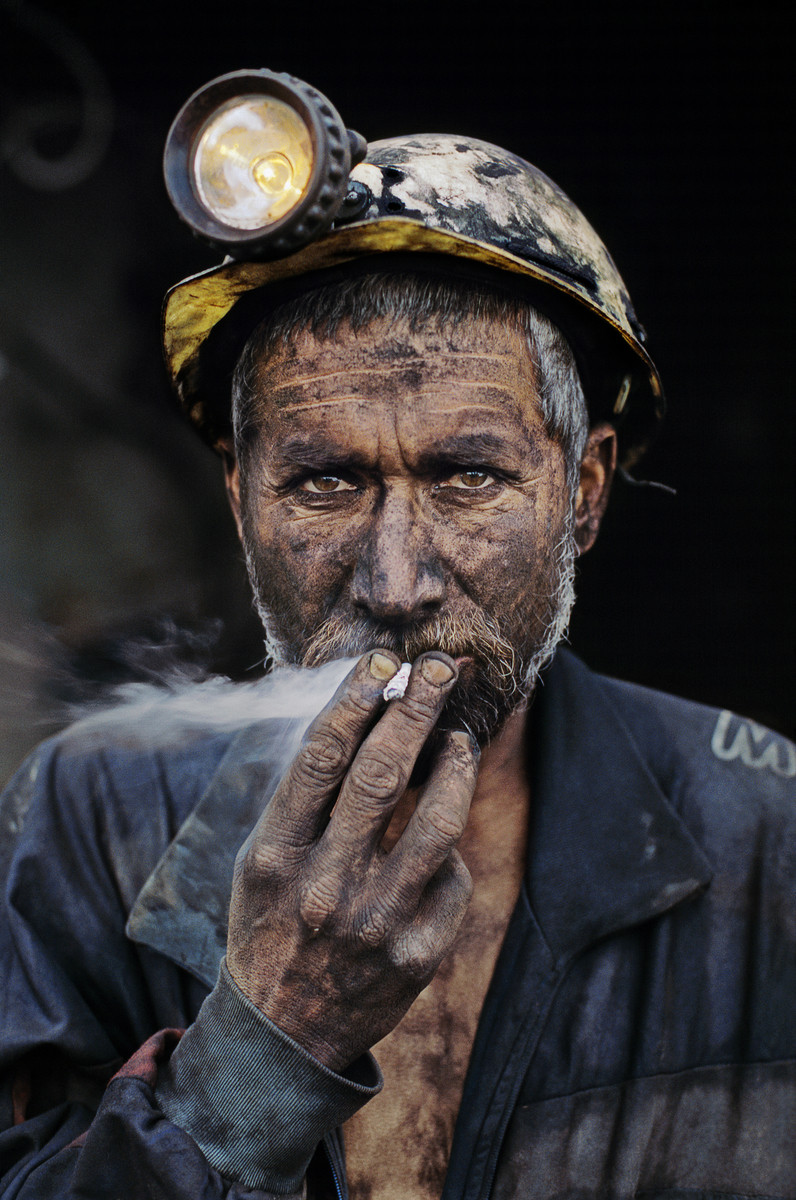Coal miner smoking a cigarette, Pol-e-Khomri.
