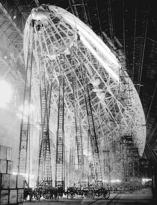 Surreal picture of a Zeppelin under construction, ca. 1935