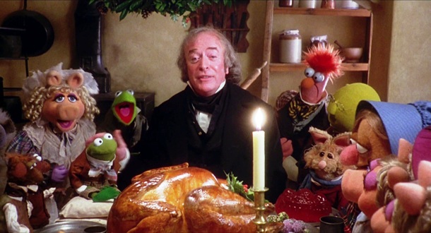 The Muppet Christmas Carol-Produced and directed by Brian Henson, The Muppet Christmas Carol is another favorite Christmas comedy inspired by the Charles Dickens novella A Christmas Carol. Released in December 1992, the movie was dedicated to the memories of Muppets creator Jim Henson and his fellow puppeteer Richard Hunt. In this version, the role of surly money-lender Ebenezer Scrooge was played by Michael Caine.