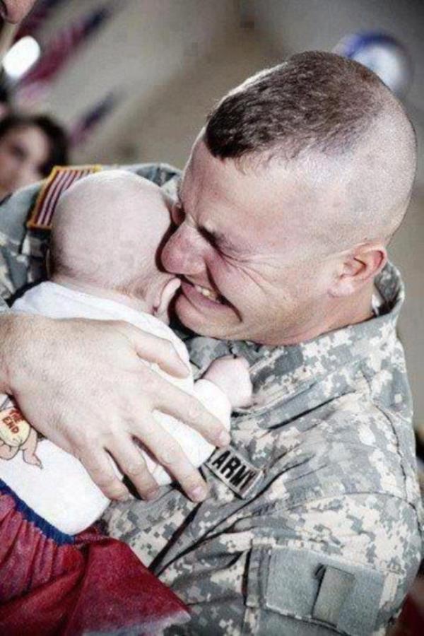 Soldiers first meeting with his child