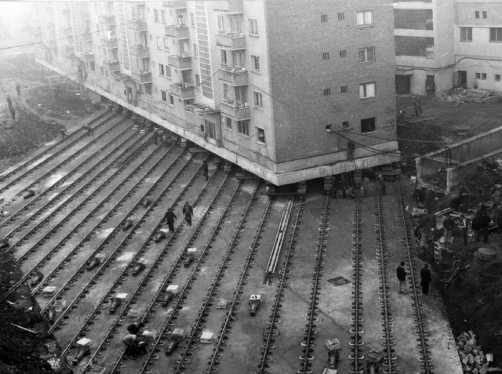 Moving a 7,600 ton apartment building to create a boulevard in Alba Iulia, Romania, 1987.