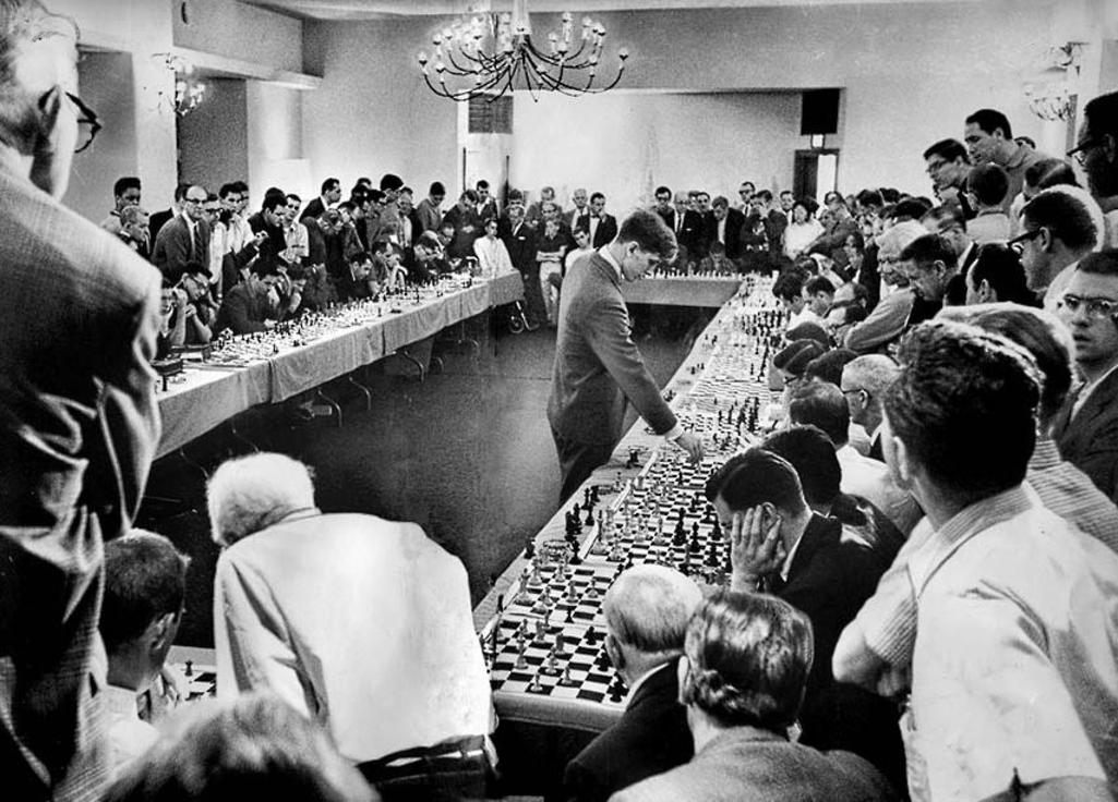 U.S. chess prodigy, Bobby Fisher, playing 50 opponents simultaneously at his Hollywood hotel on 12 April 1964. He won 47, lost 1 and drew 2.