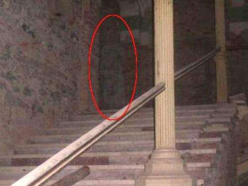 This photo was taken by Victoria Iovan in 2008 at the Decebal Hotel in Romania. Sightings of the ghost of a tall woman had been reported at the hotel for years.