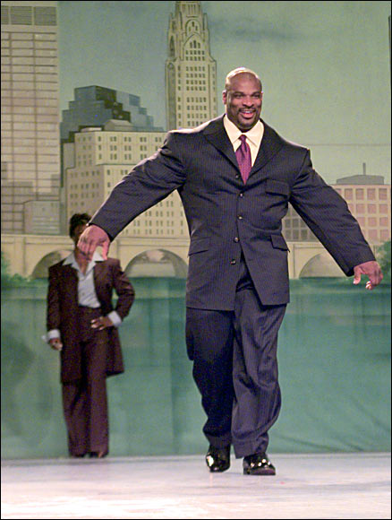 8 time Mr. Olympa, Ronnie Coleman wearing a suit.