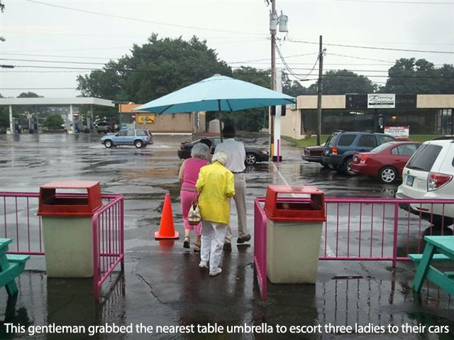 Kindness - This gentleman grabbed the nearest table umbrella to escort three ladies to their cars