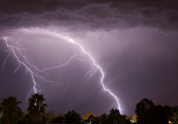 When stuck in a thunderstorm, don’t take shelter under a tree or any other tall structure. These attract lightning. Instead, search for a recessed place or depression to hide.