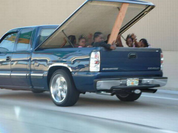 black people in pickup truck