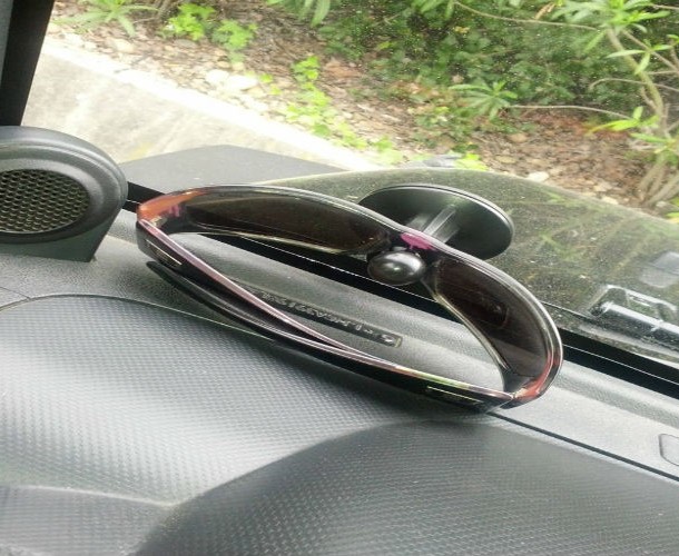 Use your unused GPS stand as a sunglasses holder
