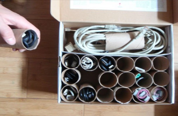 Store USB cables and other connectors in toilet paper tubes. In case this sounds too cheap, paint the tubes and make the whole thing a work of art.