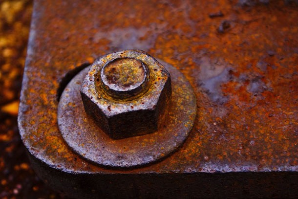 Loosen rusty bolts by pouring Coke over them.