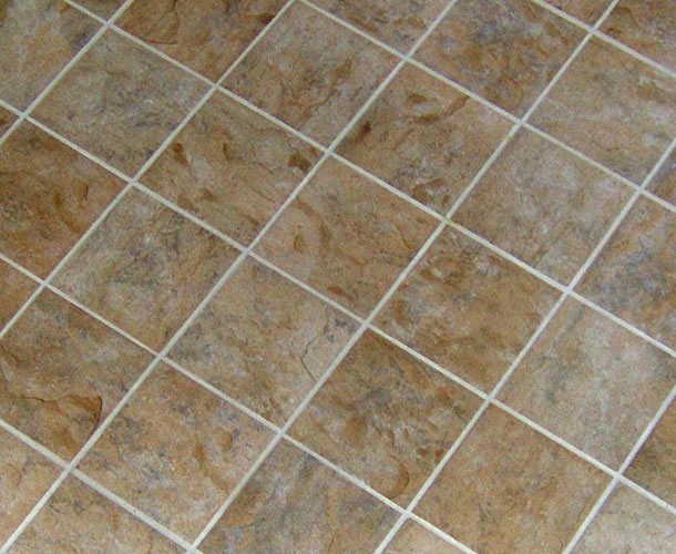 Clean tile grout. Just pour Coke onto the kitchen floor, let it stand for a few minutes then wipe up