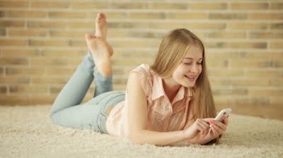 girl lying on carpet