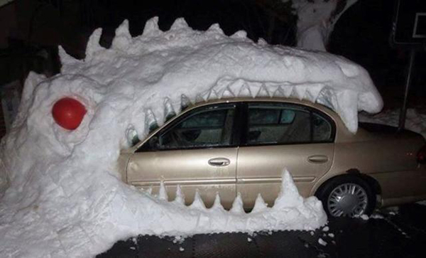 Godzilla swallows a car in Buffalo, New York...Blizzards are pretty much par for the course in Western NY. To live here you have to have a sense of humor!