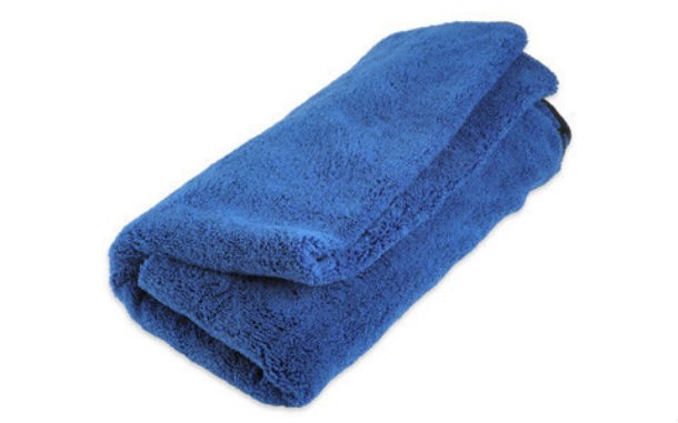 Save time and energy by throwing a dry towel into your dryer with your wet laundry. This will reduce moisture in the dryer and speed up the whole process. And yep, we tried it and it really works.