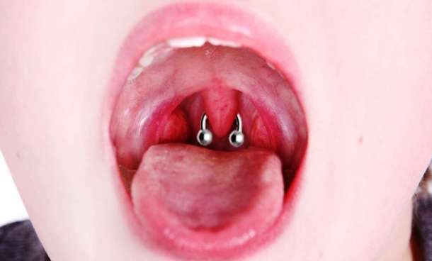 Uvula piercing...As the name implies, a uvula piercing is a body piercing through the uvula, the projection of the soft palate between the tonsils. Unlike most other types of piercing, this one can hardly be seen by other people but the procedure is very painful and difficult (which of course begs the question “Why would you do this to yourself”..but to each his own).