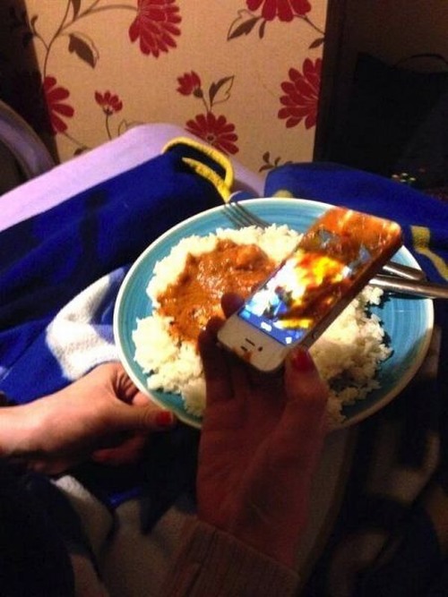 phone falls into a plate of food