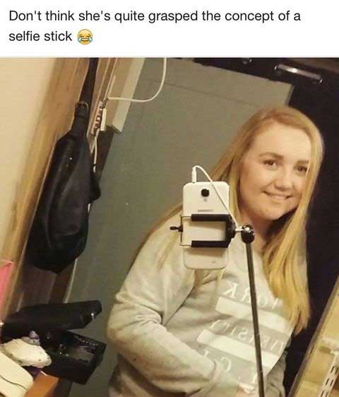 funny selfie stick - Don't think she's quite grasped the concept of a selfie sticks