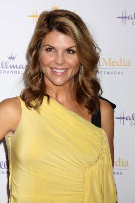 3. Lori Loughlin

Lori Loughlin has played a hot mom on more than one TV show. She played Becky Katsopolis, who had twin boys with her husband Jesse, on the hit sitcom “Full House” and, on “90210,” she played Anne and Dixon Wilson’s gorgeous mom, Debbie. Considering the time gap between “Full House” and “90210,” Loughlin hasn’t aged a day and looks just as fresh faced as she did thirteen years earlier. Needless to say, she’s one of the hottest TV moms of our time.
