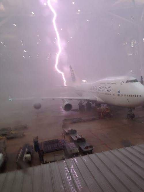 interesting pic lightning hitting plane
