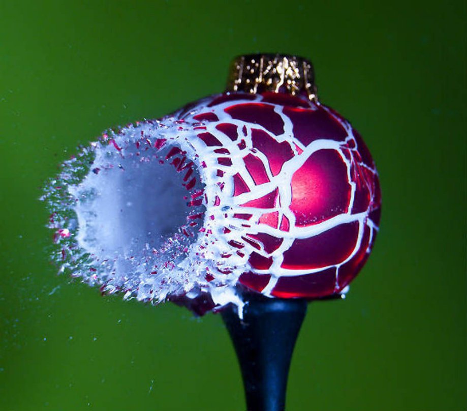 29 Awesome High Speed Images of Bullets going through Stuff!