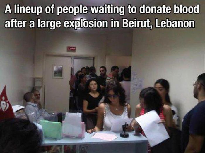 A lineup of people waiting to donate blood after a large explosion in Beirut, Lebanon