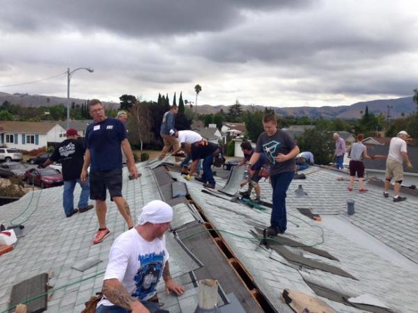 People from all over the community began to show up. 40 people showed up to work on the elderly man’s roof – while others donated water, donuts and pizza to volunteers.