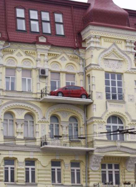 car on apartment balcony