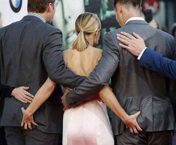 woman touching man's ass