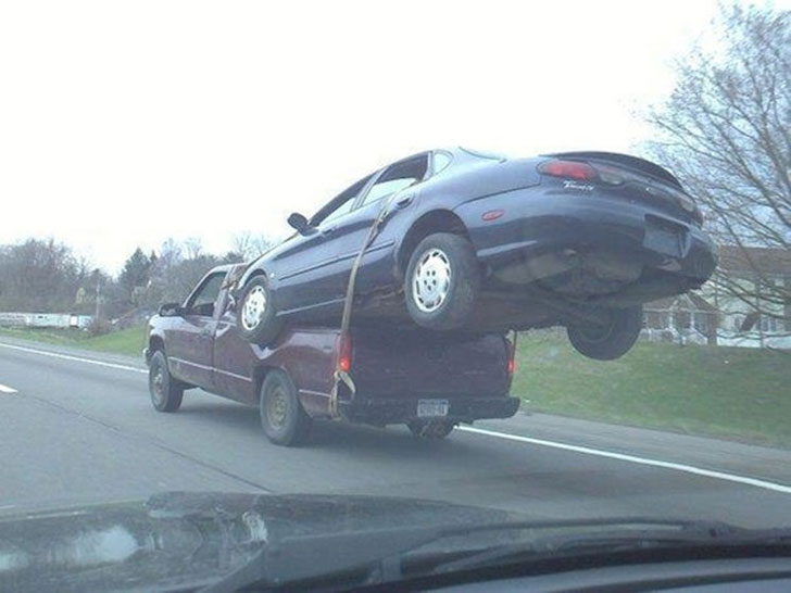 truck pulling a car