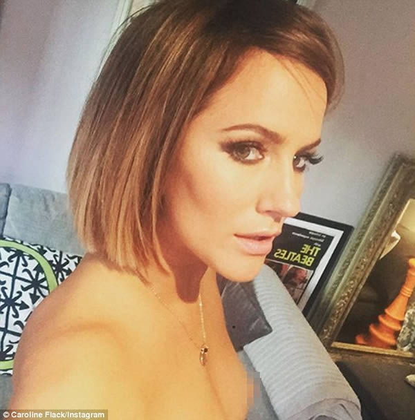 A celebrity accidentally shares a saucy snap of her bare chest online ...Caroline Flack revealed just a little too much in her latest selfie. Standing topless as she posed for a photo, the 35-year-old (who is soon releasing her first autobiography, humorously titled Storm in a C Cup) clearly forgot to crop the image, resulting in an awkward nip-slip.

The X Factor host deleted the snap just moments later though it seems it wasn't quite fast enough as fans instantly bombarded her Instagram account with jokes and crude remarks. The TV presenter re-uploaded the image though this time she cropped it so that her breast was completely out of the picture, but that still hasn't stopped some of her 605,000 followers making remarks. "Best to 'crop' these people from your life and 'nip' the hate in the bud," one fan quipped, before another reminded her, "We've seen everything."