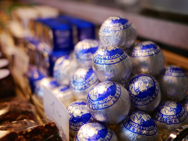 Mozartkugel are small balls of marzipan, nougat, and chocolate from Austria.
