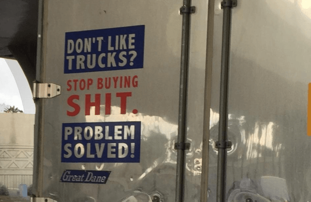 street sign - Don'T Trucks? n. Stop Buying Shit Problem Solved! Great Dane
