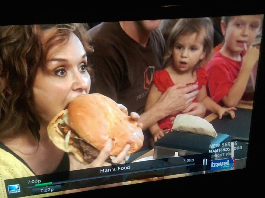 random pic girl eats giant hamburger - New Series Man Finds Ood Onight 918 travel p Man v. Food p Orrectv p