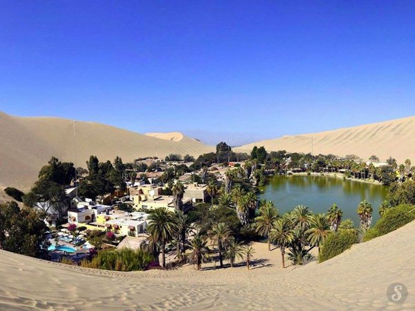 Peru : Oasis of Huacachina Huacachina is a village in the Ica Region, in southwestern Peru and offers an oasis. In 1999, only 115 people lived there...