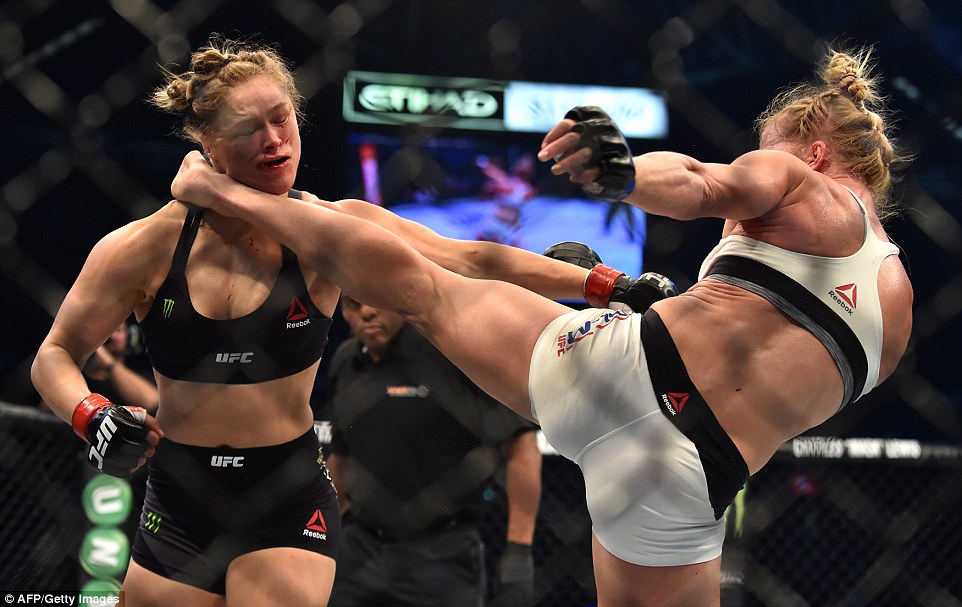 Round 2. Rousey dives in and gets caught with a couple of counter punches. Holm is a different level of striker. Holly Holm with a head kick that knocks Rousey down.