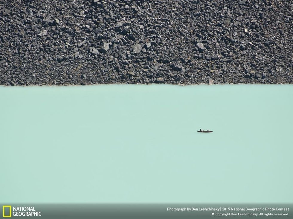A Canoe Ride on Lake Louise...The photographer, Ben Leshchinsky, says: "This disorienting photo was taken from a cliff overlooking Lake Louise in Banff National Park. The two people are enjoying a canoe ride on Lake Louise's turquoise waters."