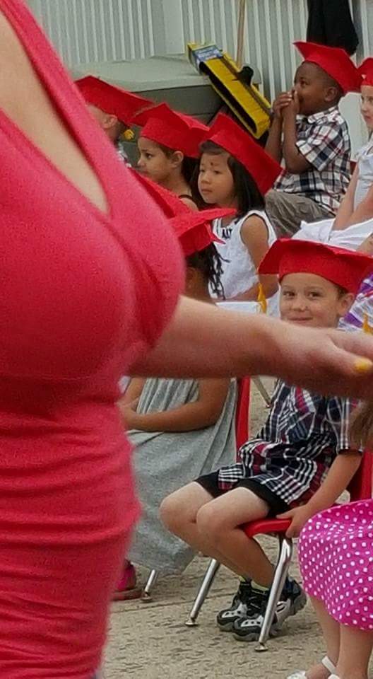 kid staring at boobs