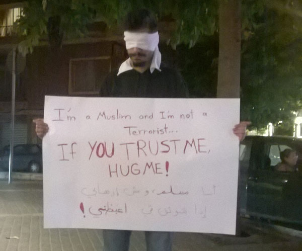 sign - I'm a Muslim and I'm not a Terrorist... If You Trustme, Hug Me!