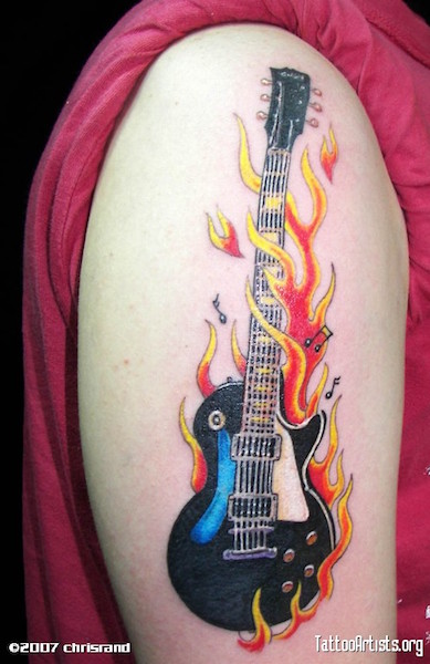 20 Tattoos That Make People Look Like They're on Fire!