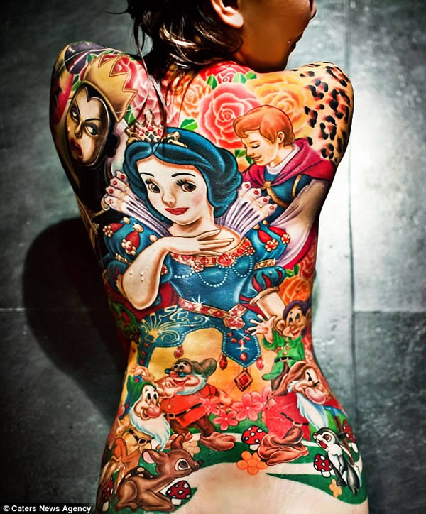 The woman who has the entire Snow White cast of characters tattooed on her back.Lots of children love Disney princesses, but eventually, most of them grow out of it. Not so for Annfaye Kao, 27, of Taichung, Taiwan. Annfaye loves Snow White and the Seven Dwarfs so much that she got the entire cast tattooed on her back. The colorful patchwork of cartoons was inspired by a dream she once had about the fairy tale.