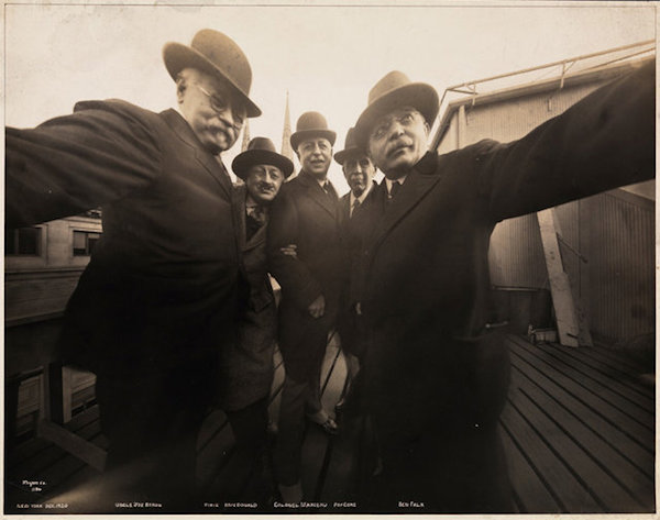 Anonymous New York Photographers...The above photo was taken in 1920 on a New York City rooftop. The caption reads: "Five photographers posing together for a photograph on the roof of Marceau's Studio, while Joseph Byron holds one side of the camera with his right hand and Ben Falk holds the other side with his left hand."