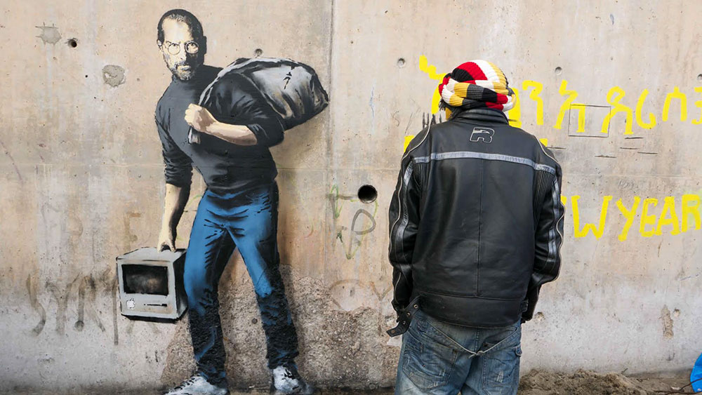 STEVE JOBS AS A SYRIAN REFUGEE by BANKSY