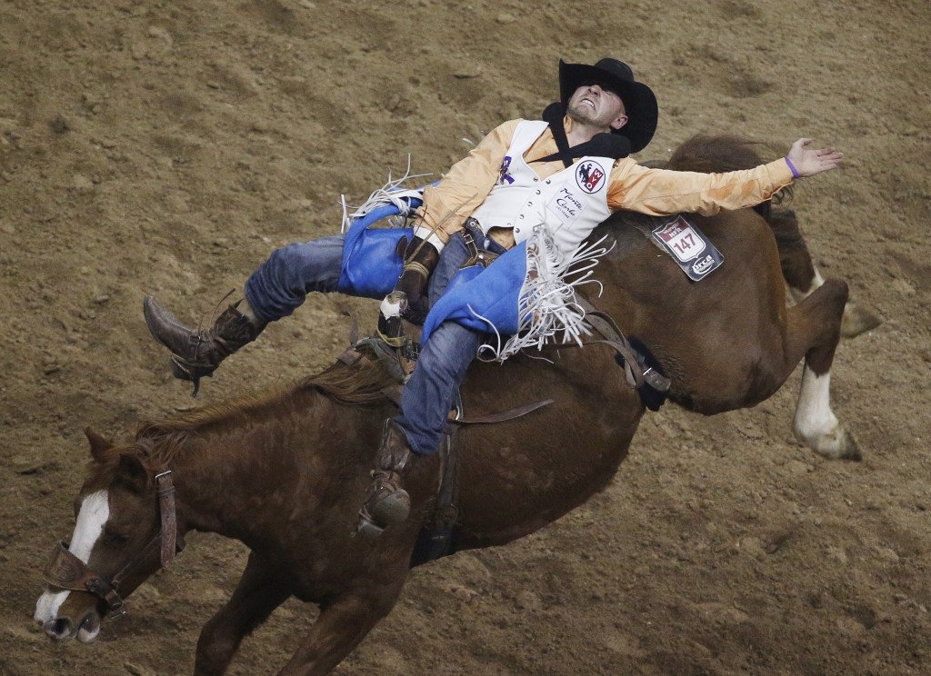 Seth Hardwick competes in a bareback riding event in Las Vegas.