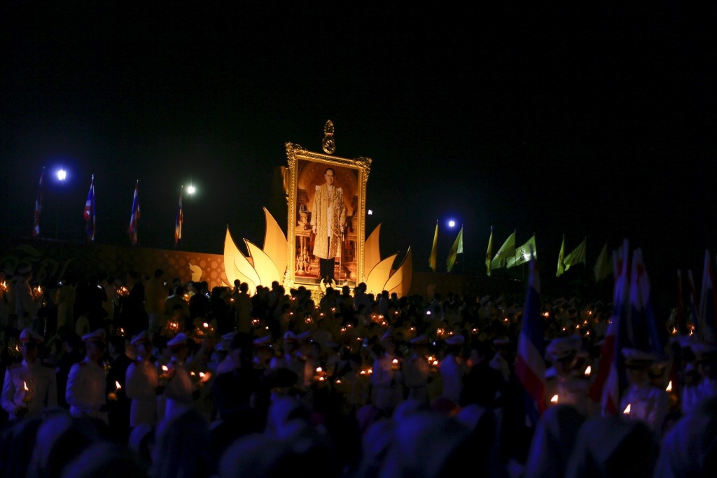 Army officials gather to celebrate the 88th birthday of Thailand's King, Bhumibol Adulyadej.