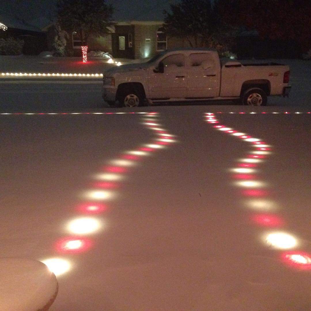 christmas lights under snow