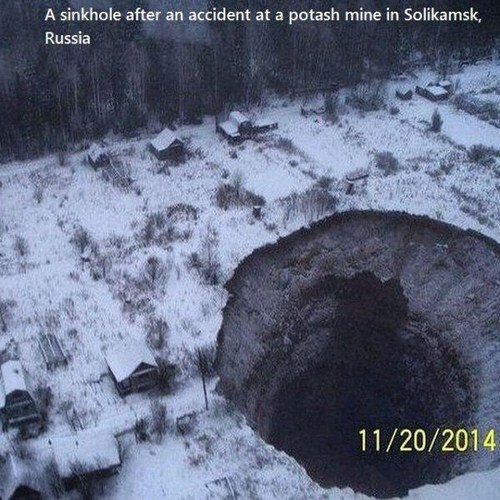 gates of hell in russia - A sinkhole after an accident at a potash mine in Solikamsk, Russia 11202014