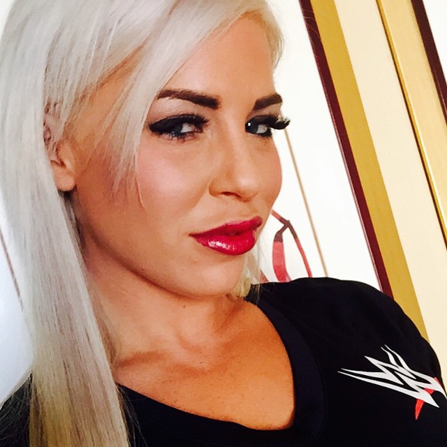 Fighting in WWE’s NXT division since 2013, Dana Brooke stands out thanks to the villainous roles she takes as much as her muscular physique. Indeed, her trademark look is the product of her second career as a bodybuilder and fitness competitor which she undertakes under her birth name Ashley Sebera.