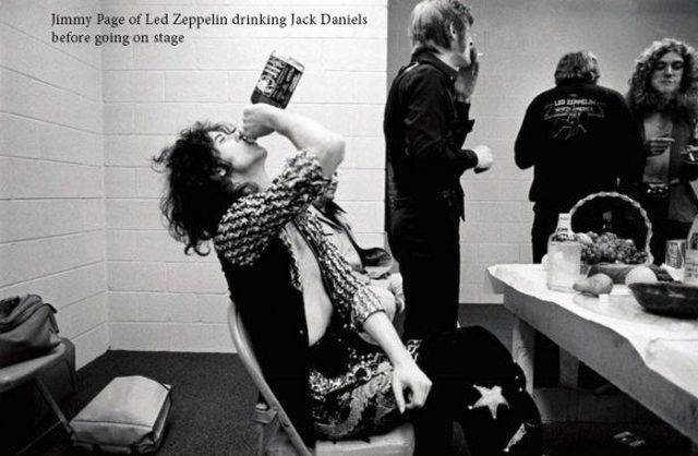 jimmy page jack daniels - Jimmy Page of Led Zeppelin drinking Jack Daniels before going on stage