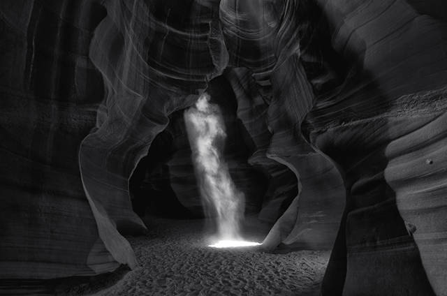 This Is The Most Expensive Photograph In the World $6.5 Million
“Phantom” – A photograph by Australian photographer Peter Lik, was sold to a private collector for a staggering $6.5 million. The black and white image shows a beam of light resembling a ghost, and was captured at Arizona’s Antelope Canyon, a slot canyon that’s popular among landscape photographers.